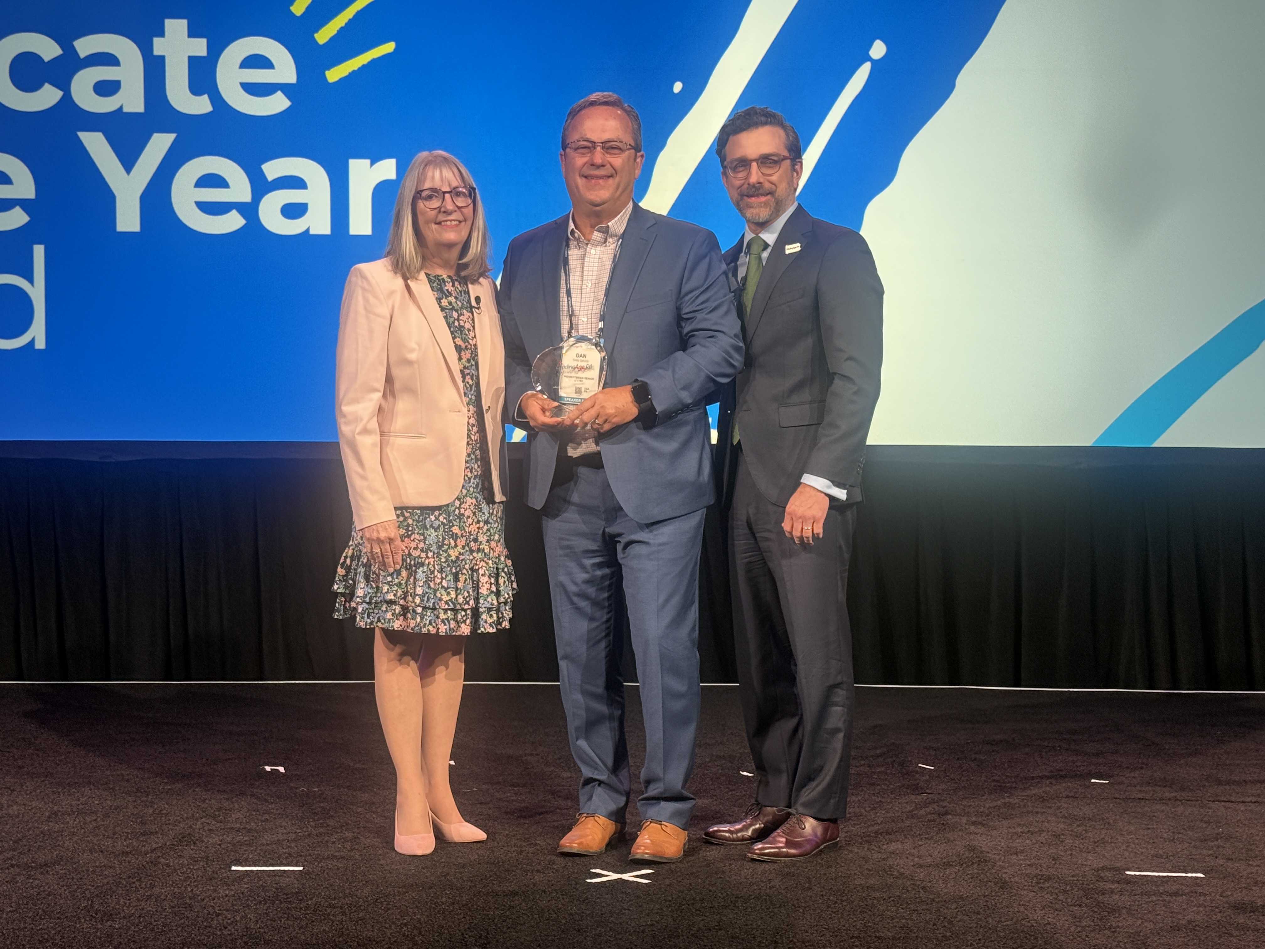Dan Davis receiving the Advocate of the Year Award